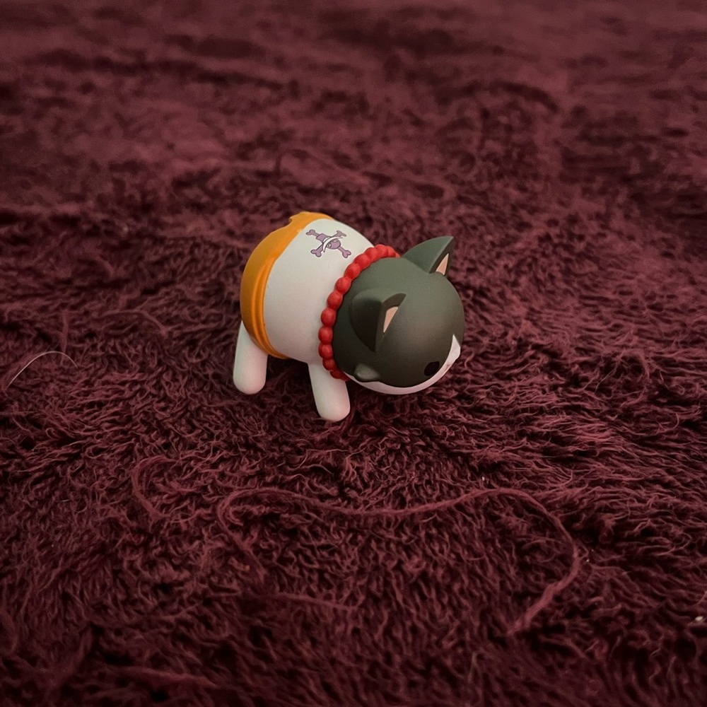 Onepiece Cat Figurine with Red and Orange Accents